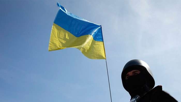 Scout Hoists Ukrainian Flag on Enemy Positions