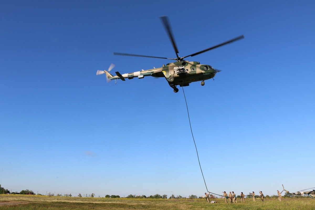 Cadets-reconnaissance men drill actions on comprehensive usage of “Adapter – V1” helicopter equipment
